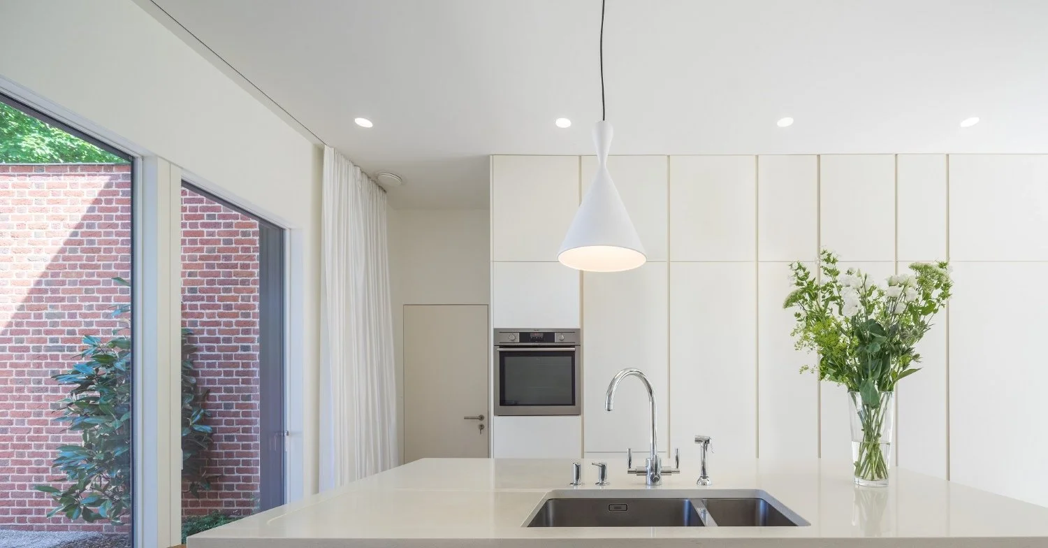 Award-winning contemporary replacement dwelling in Newbury, Berkshire, combining Arts and Crafts influences, Flemish bond brickwork and high-quality modern family living