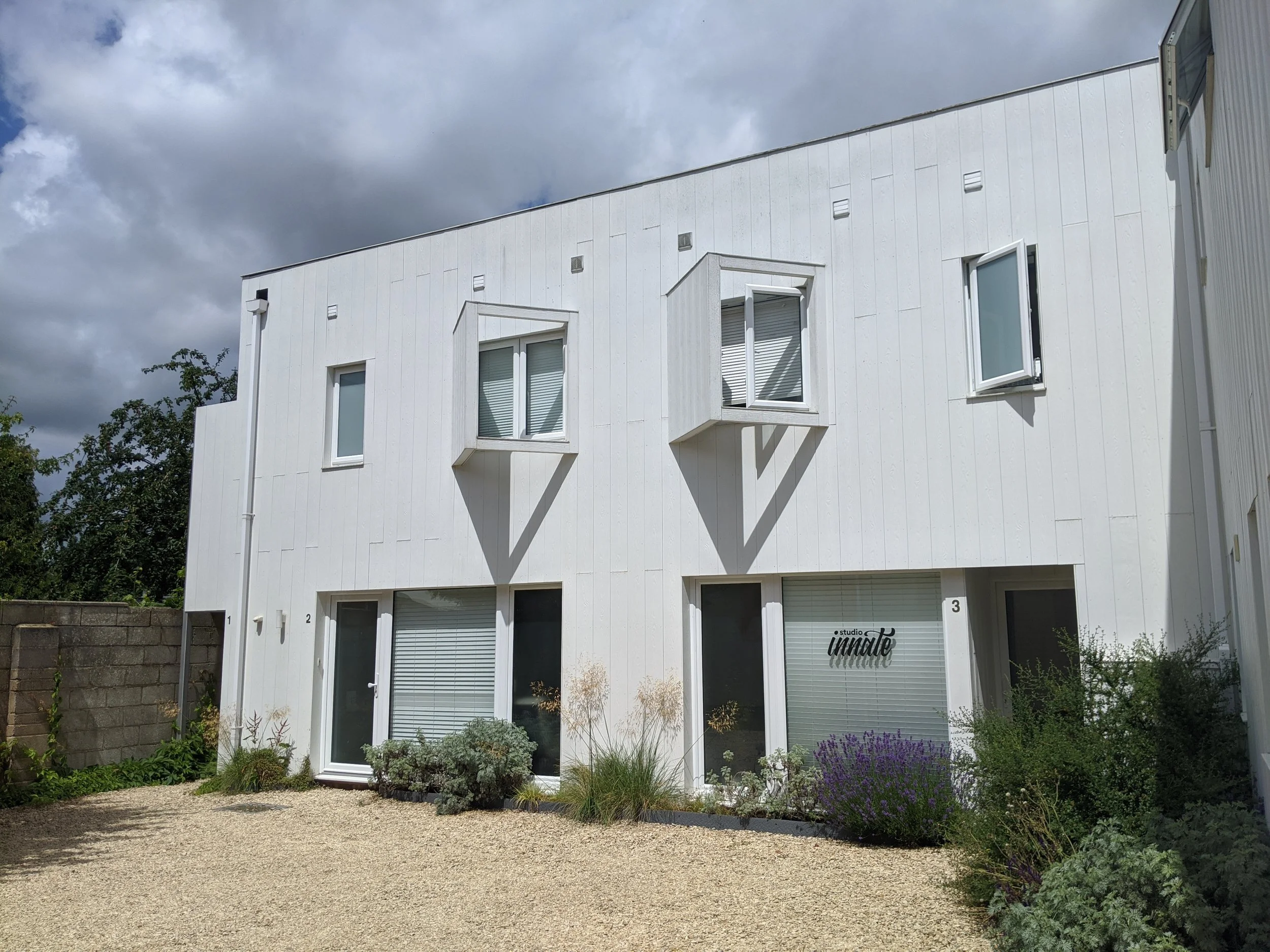 Brownfield residential redevelopment in Newbury, Berkshire, transforming a former warehouse site into 10 high-quality homes through urban regeneration and sensitive design - Edge Architecture