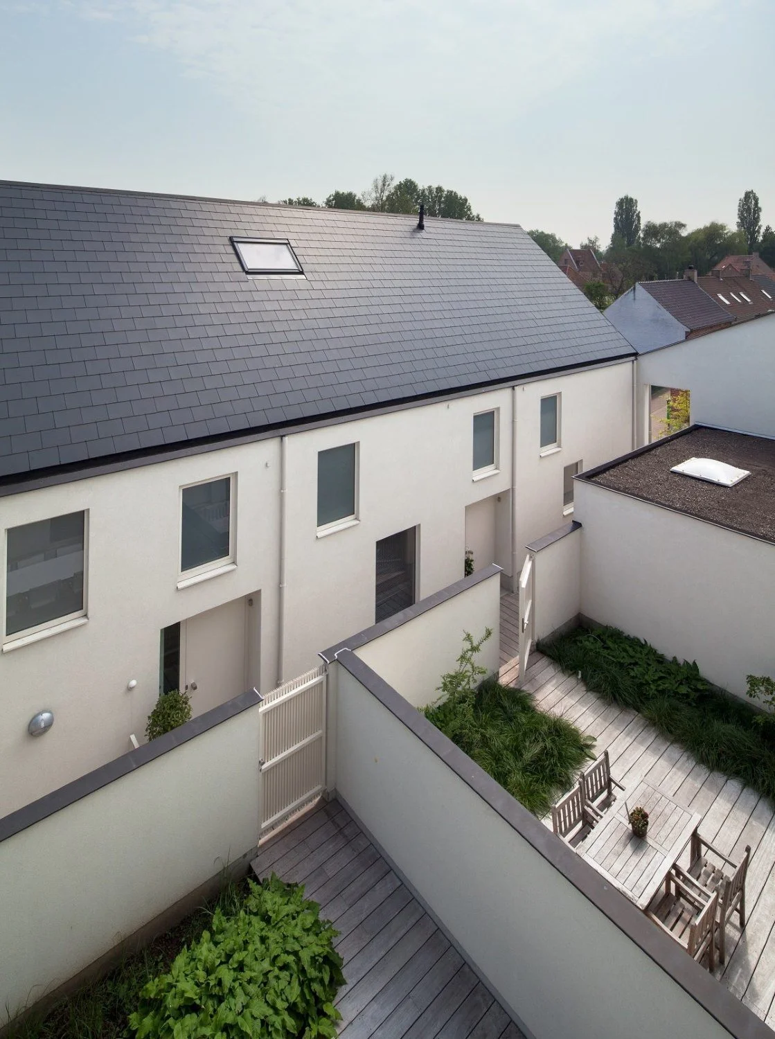 Residential courtyard development in Flanders, Belgium, creating attractive new homes through innovative urban design and housing-led placemaking - Edge Architecture