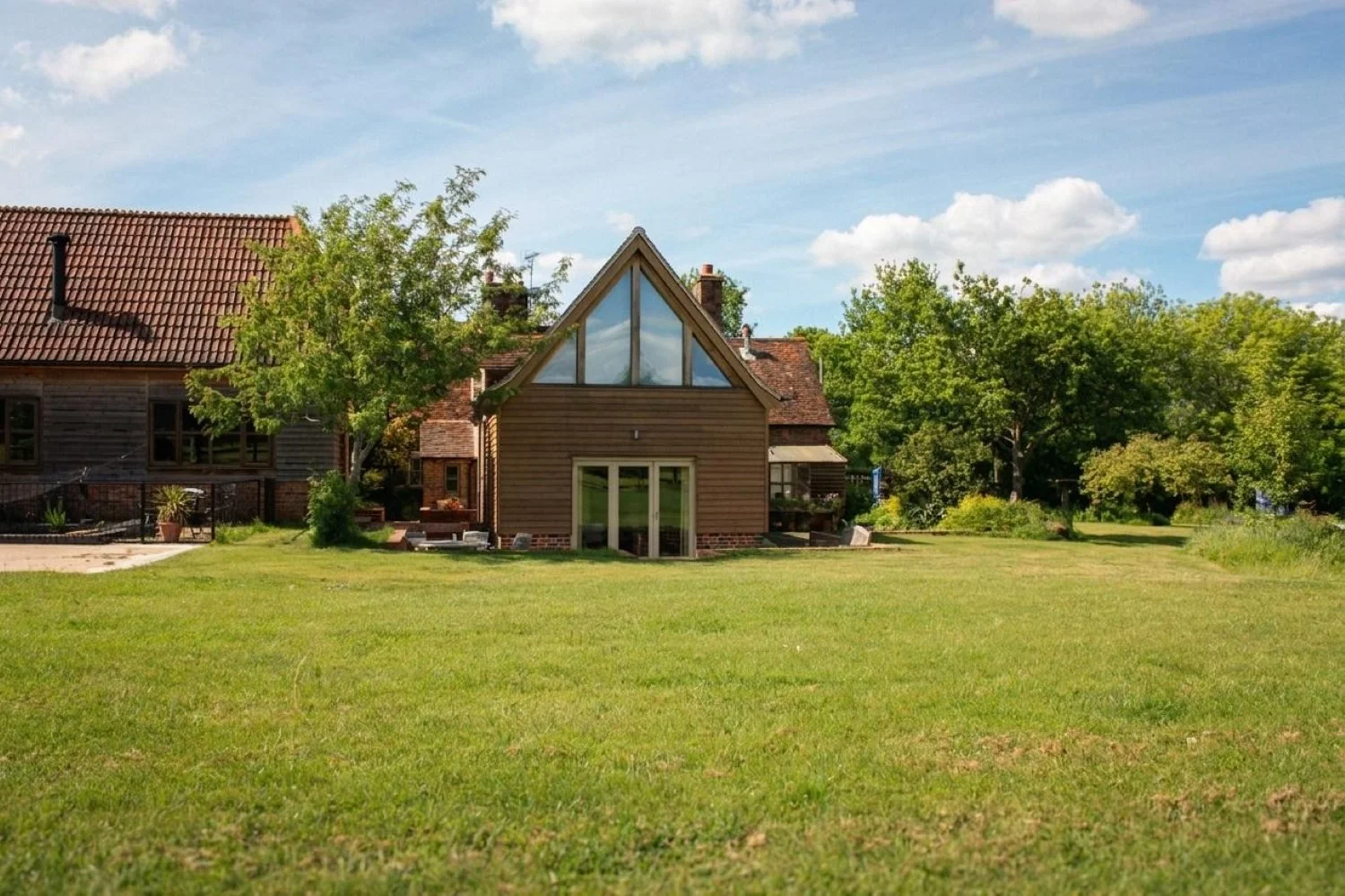 Grade II listed farmhouse extension in Berkshire, carefully designed to respect the historic character and architectural significance of the property - Edge Architecture