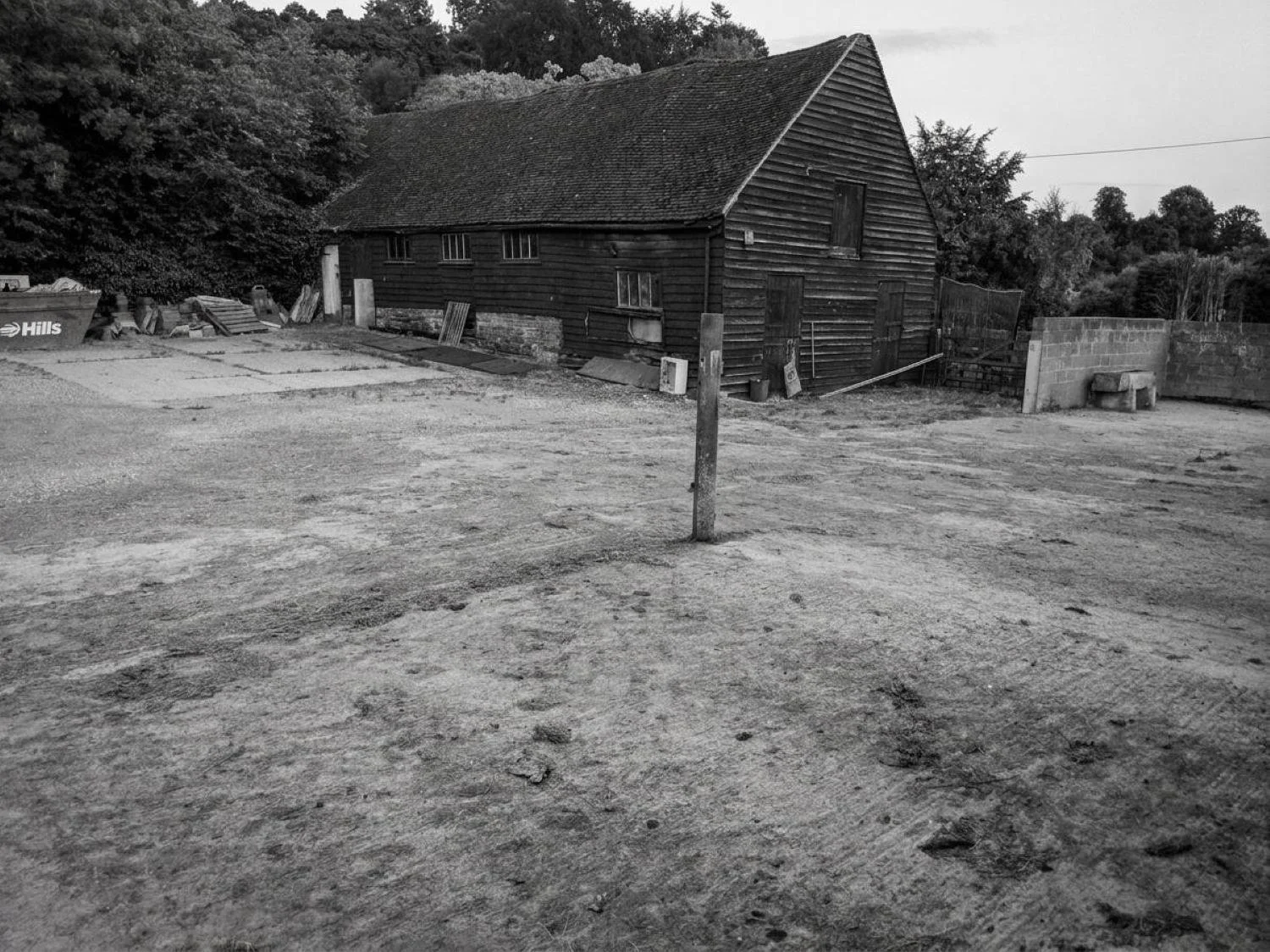 Class Q barn conversion in Enborne, Berkshire, transforming a rural agricultural building into a four-bedroom family home using reclaimed materials and sustainable design - Edge Architecture