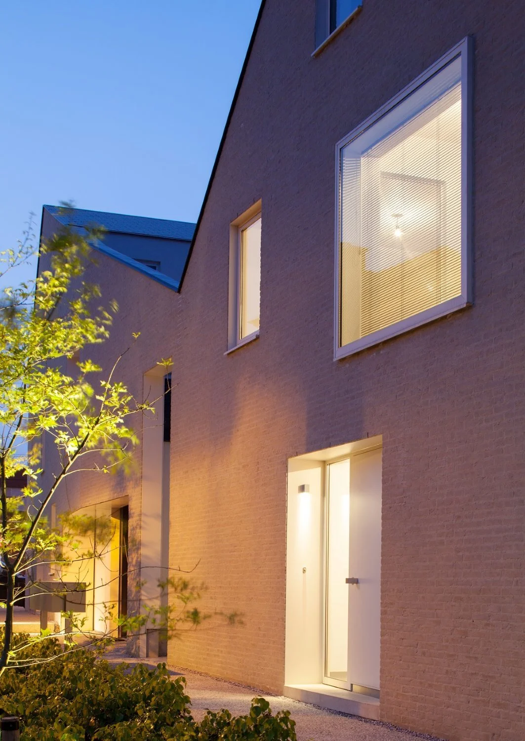 Residential courtyard development in Flanders, Belgium, creating attractive new homes through innovative urban design and housing-led placemaking - Edge Architecture