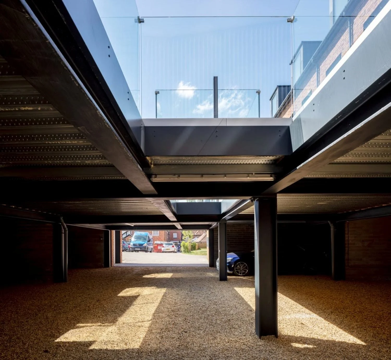 Infill development in Hungerford, Berkshire, delivering three townhouses and ten apartments within a conservation area, combining contemporary architecture with a sensitive historic setting - Edge Architecture