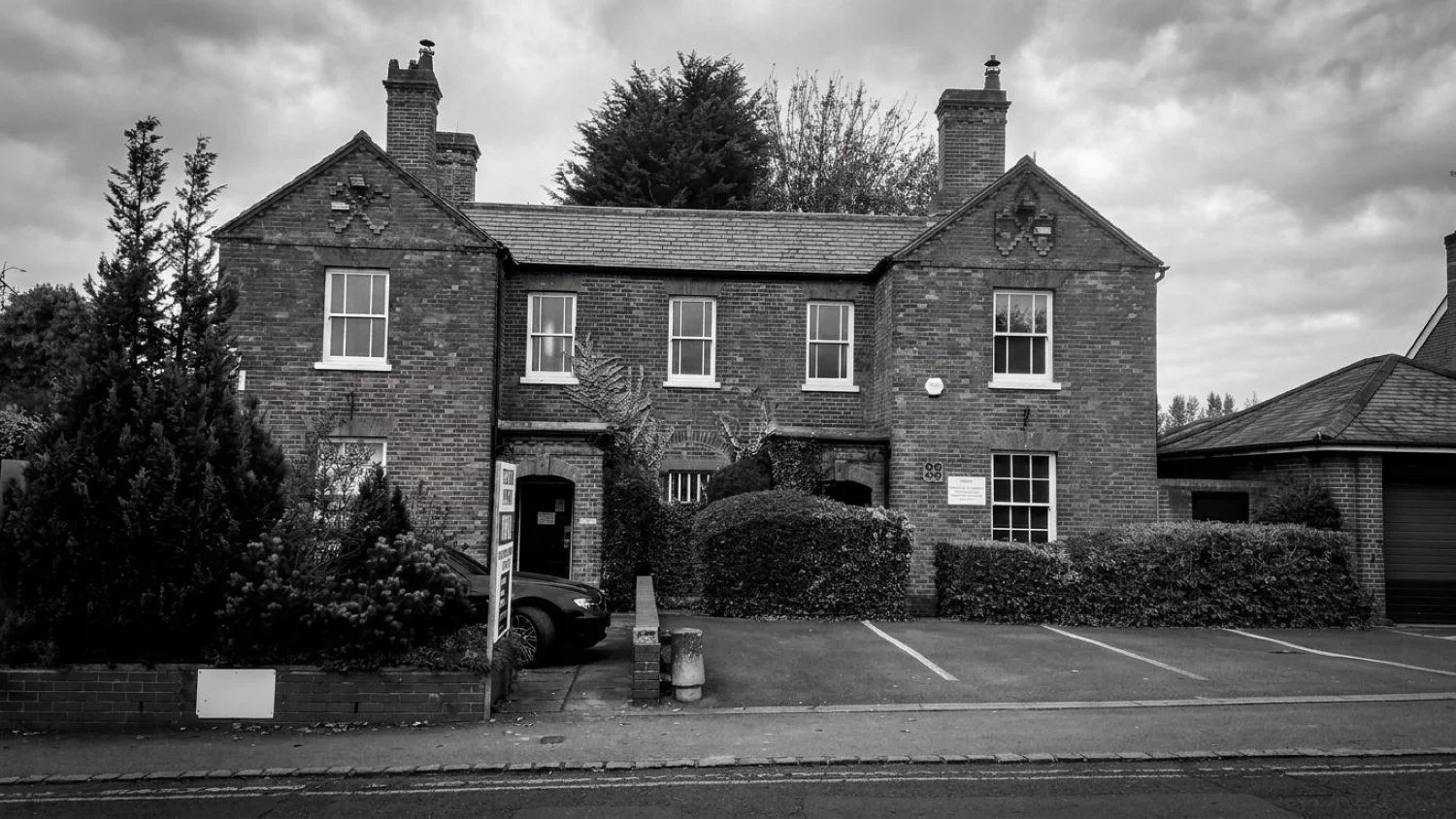 Converted Victorian police station in Hungerford, Berkshire, transformed into four high-quality homes within the conservation area, retaining historic architectural features through sensitive heritage-led design by EDGE Architecture.