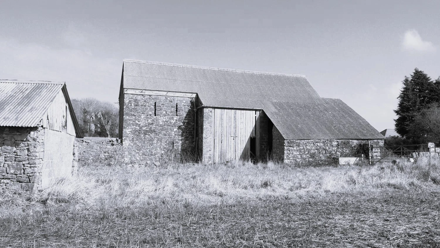 Survey, feasibility study and planning application for the sensitive conversion of a group of redundant stone-built agricultural barns on the Crown Estate, preserving their rural character while securing a sustainable and viable future use - Edge Arc