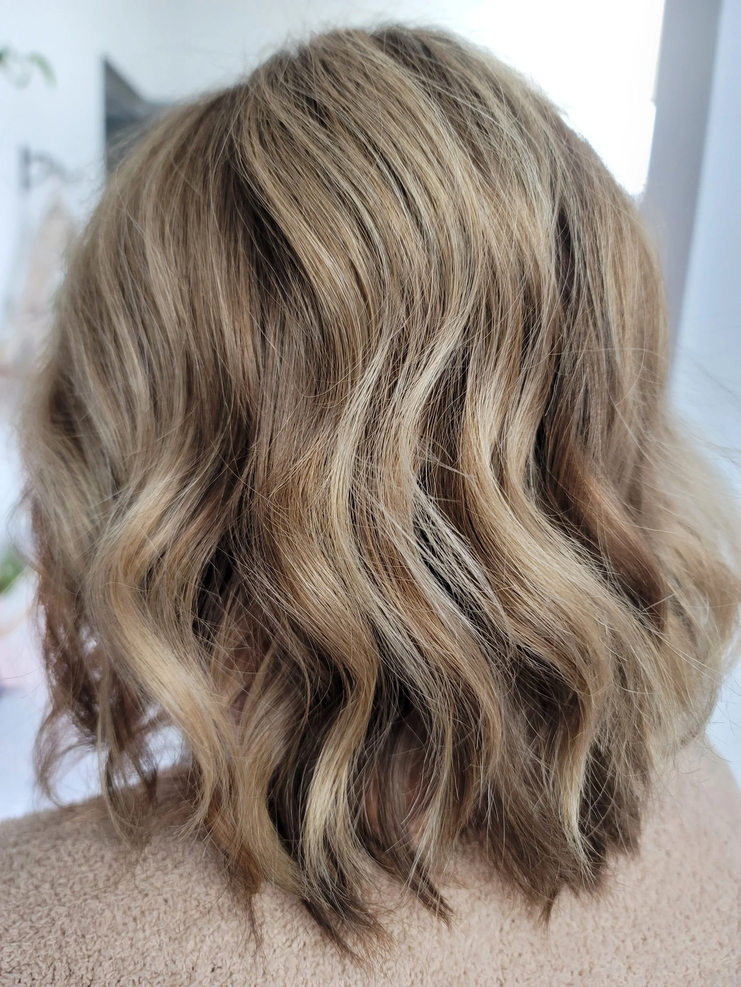 Cool brunette with blonde highlights.