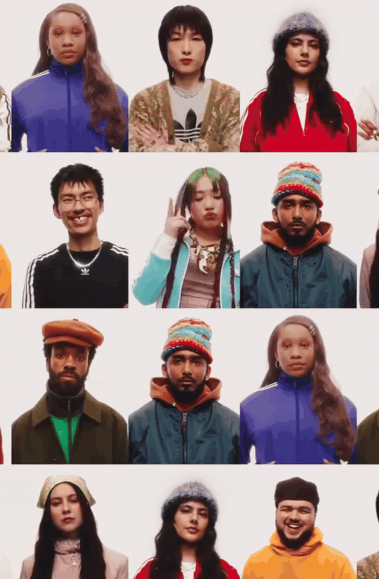 Lexwell-Partners - Group of diverse young people standing in front of a plain white background, posing for a photo.