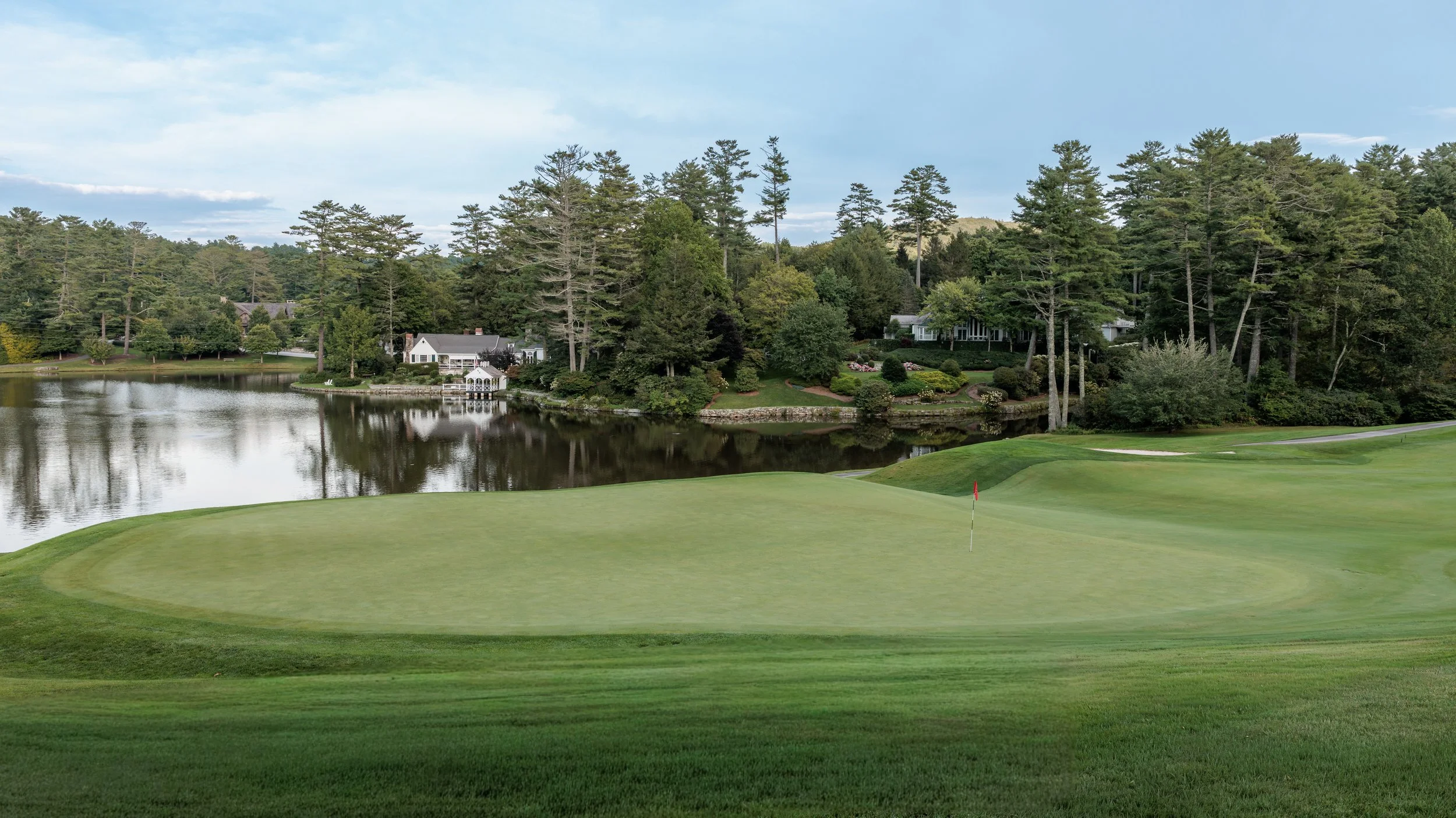 Golf course and lake community amenity photographed for residential real estate marketing.