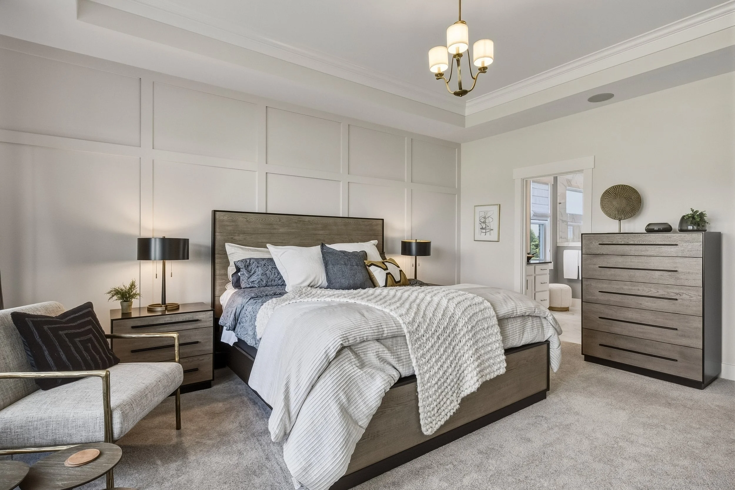 Primary bedroom with neutral finishes photographed for a residential real estate listing