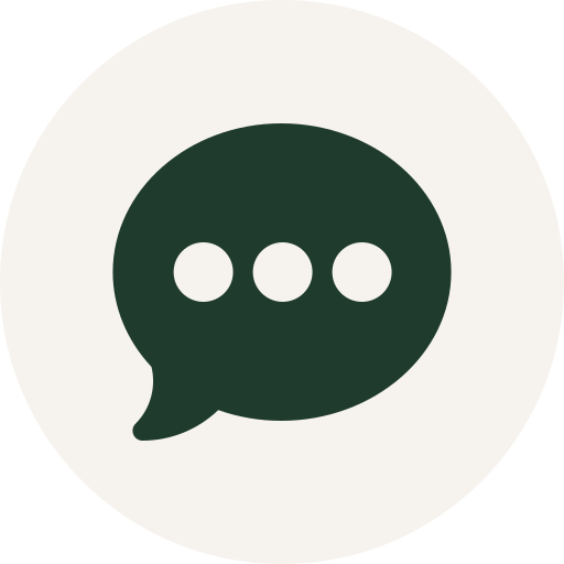 A dark green speech bubble icon with three white dots inside, representing a messaging or chat feature.