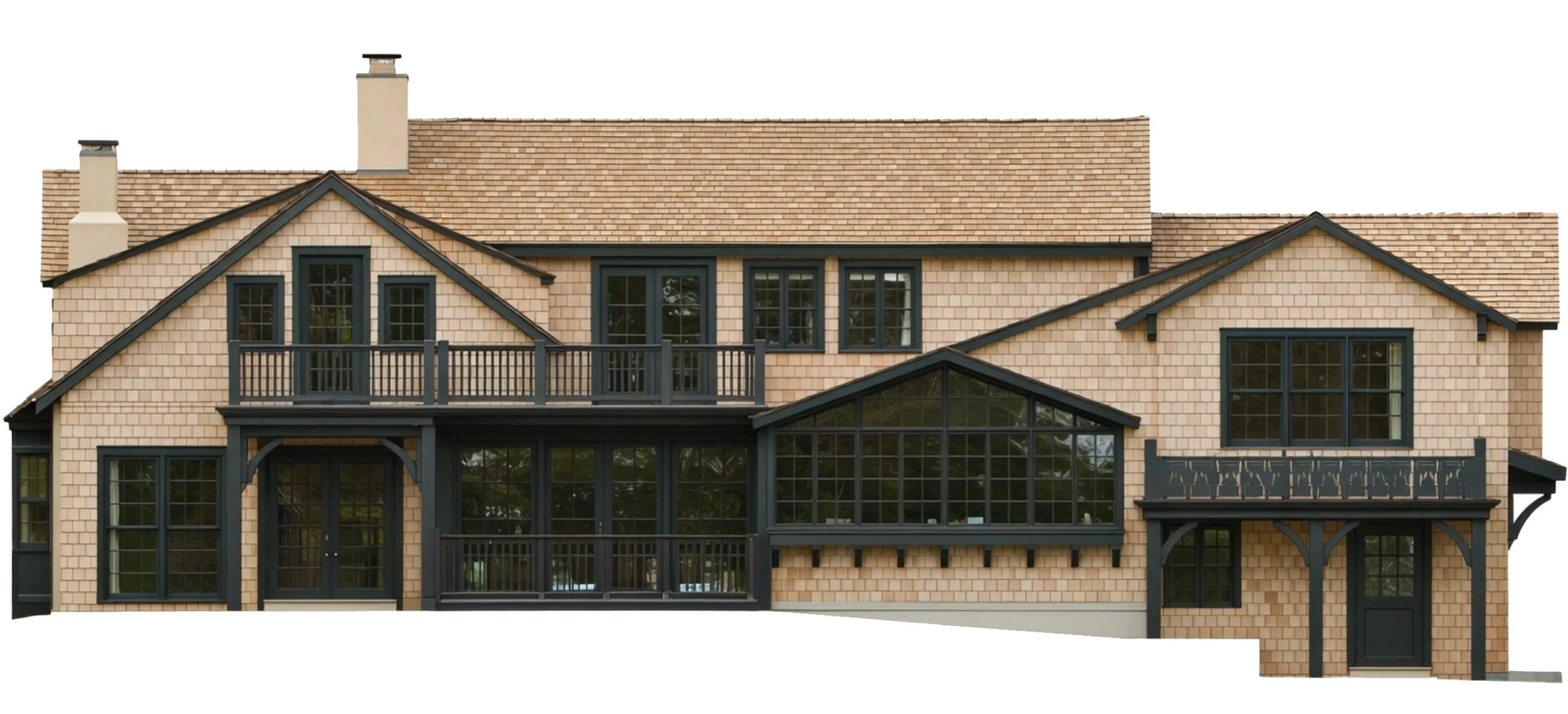 The rear view of a multi-story house with beige shingles, black window frames, and a black balcony railing, featuring multiple windows and a glass-enclosed porch.