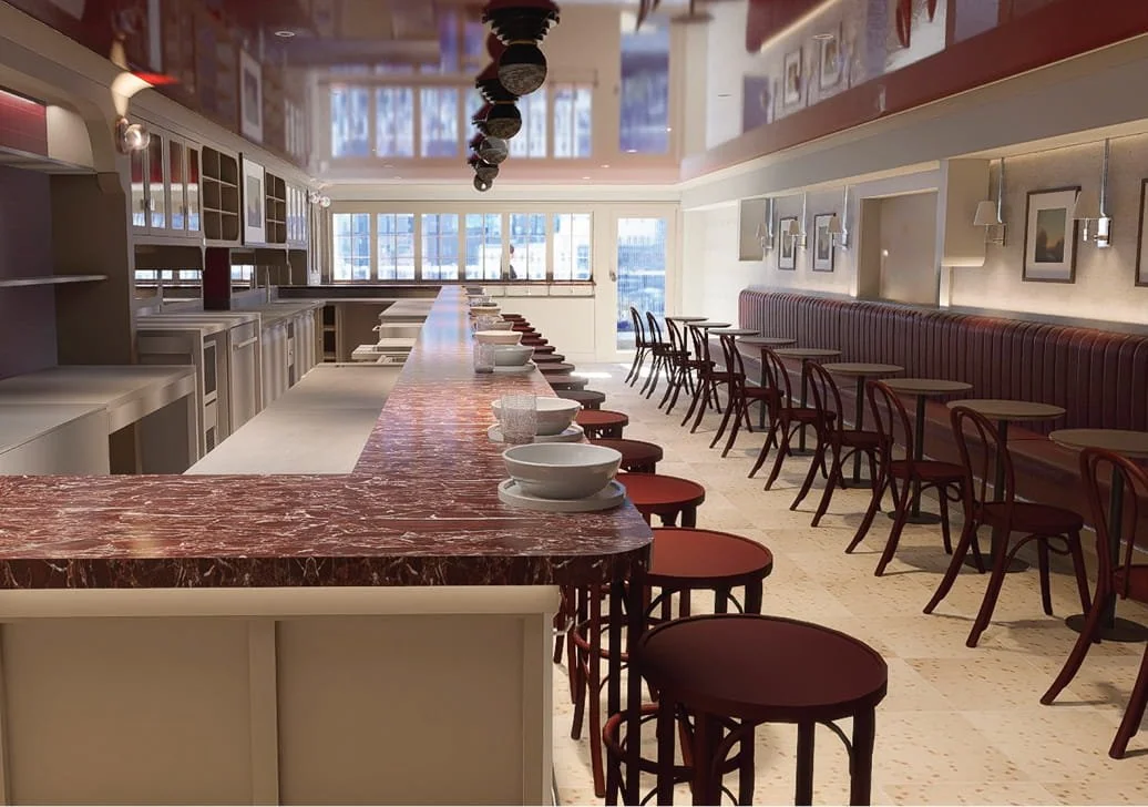 Empty restaurant with a long marble counter, red chairs, and a row of tables with chairs along the wall, large windows letting in natural light.