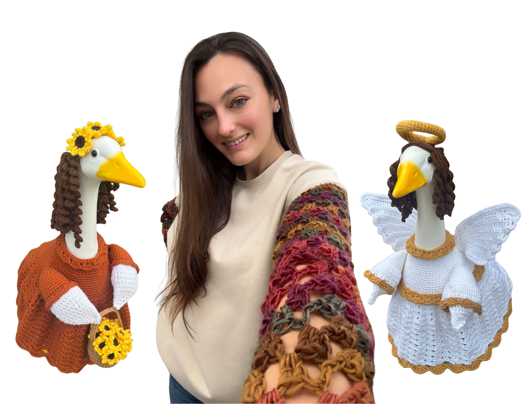 A young woman taking a selfie with two fabric-crafted goose dolls that are dressed in colorful crochet outfits, one with a sunflower headband and the other with a halo, against a plain white background.