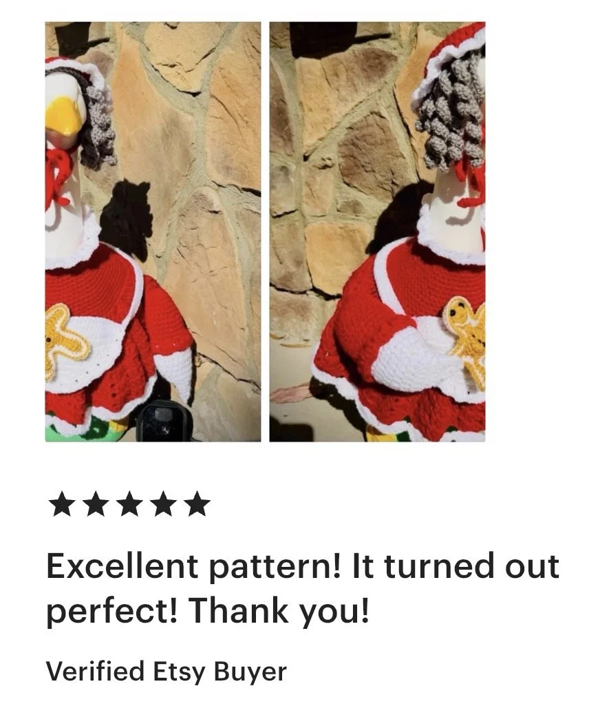 A handcrafted crochet Christmas ornament in the shape of a Santa Claus figure with a black background and tan stone wall background.