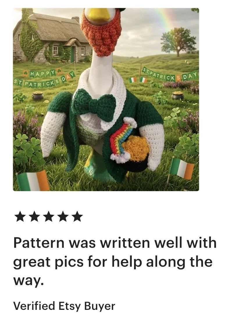 A knitted turkey wearing a green bow tie and sweater, holding a small rainbow and pumpkin, with Irish flags, a stone house, green hills, a rainbow, and Saint Patrick's Day decorations in the background.
