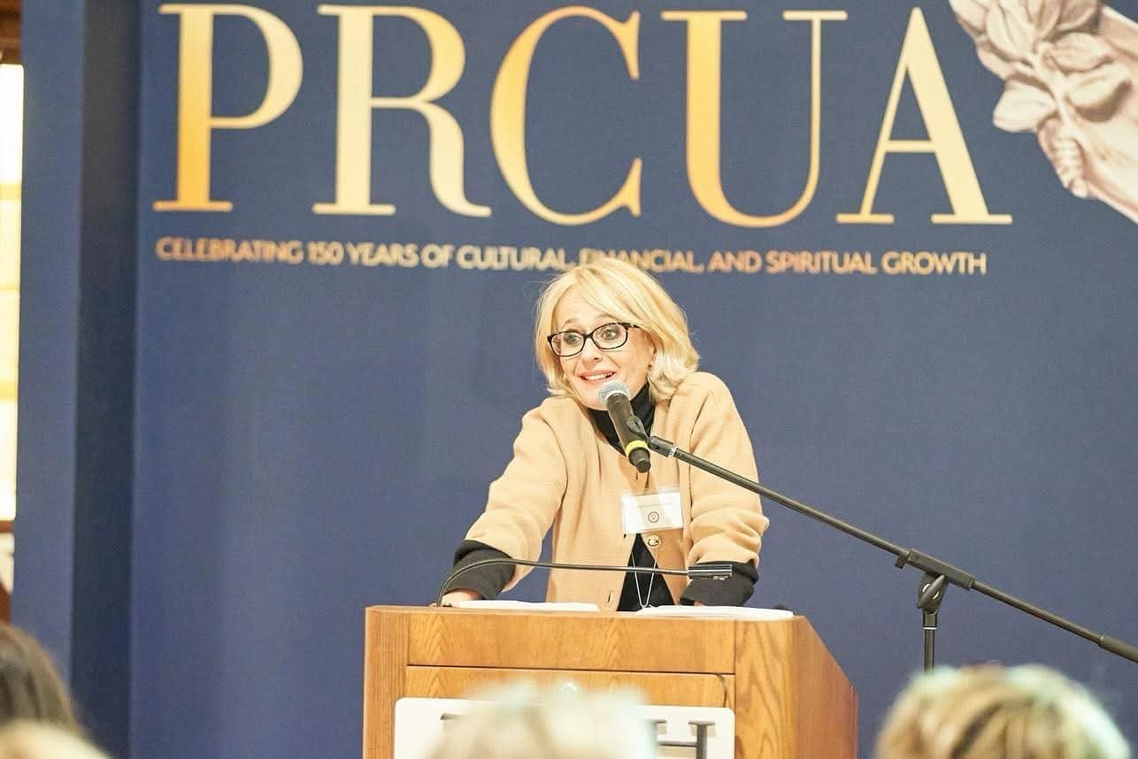 Dr. Pilewicz speaking at an event