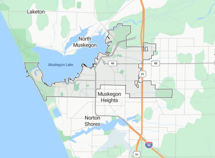 Map of Muskegon, Michigan, showing lakes, highways, and neighborhoods including North Muskegon, Muskegon Heights, and Norton Shores.