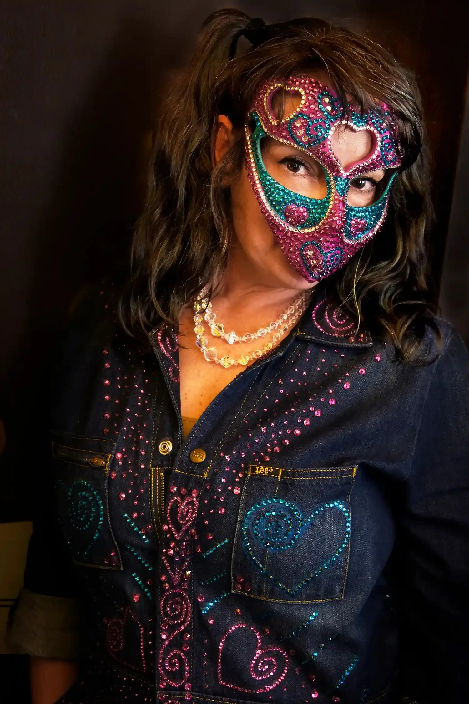 chelle bee wearing LOVE TRIBE 3D printed rhinestone mask in fuchsia teal and white, Morlock Masked Ball, East Village NYC 2026