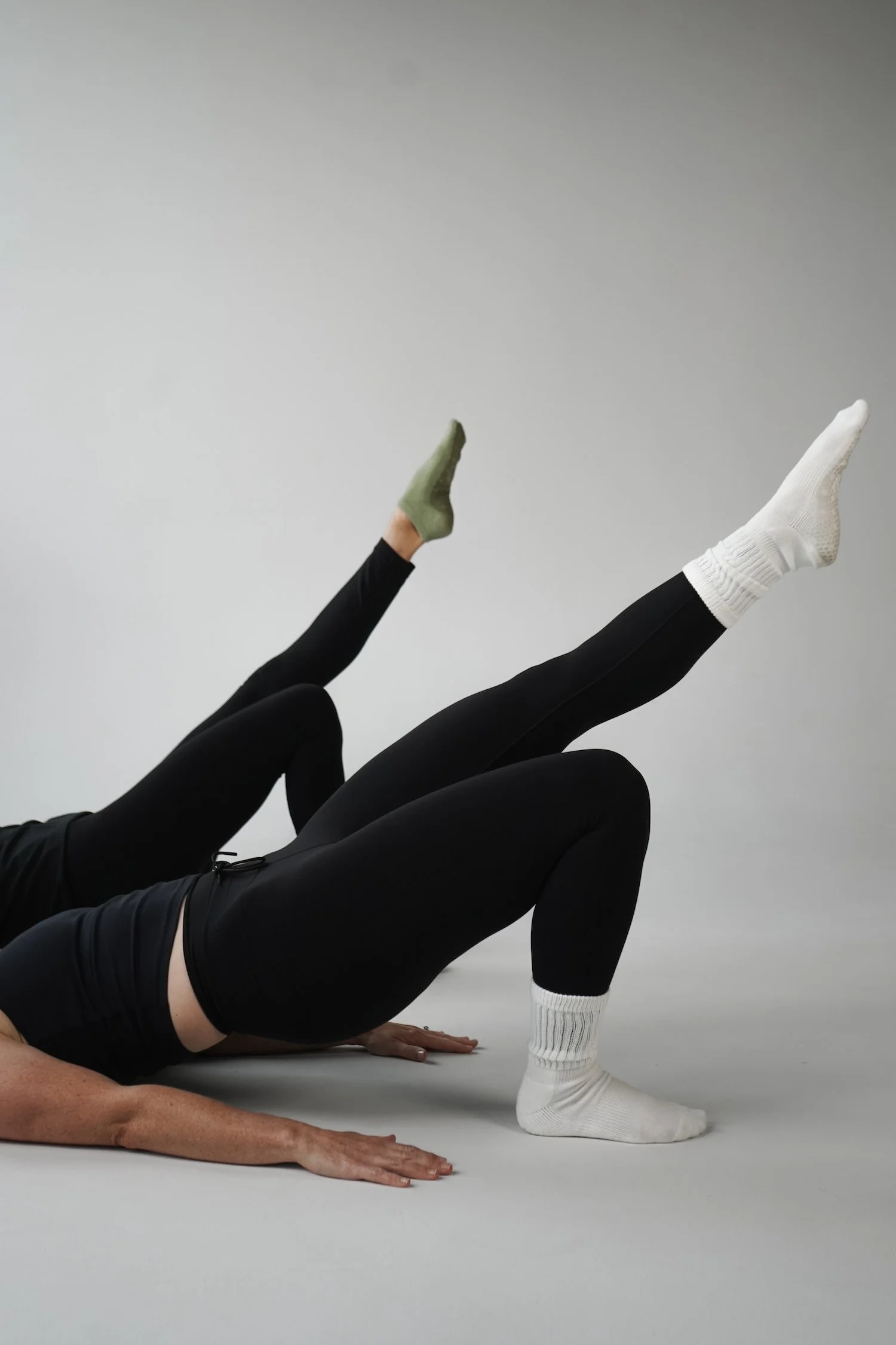 Image of legs stretched in a pilates class