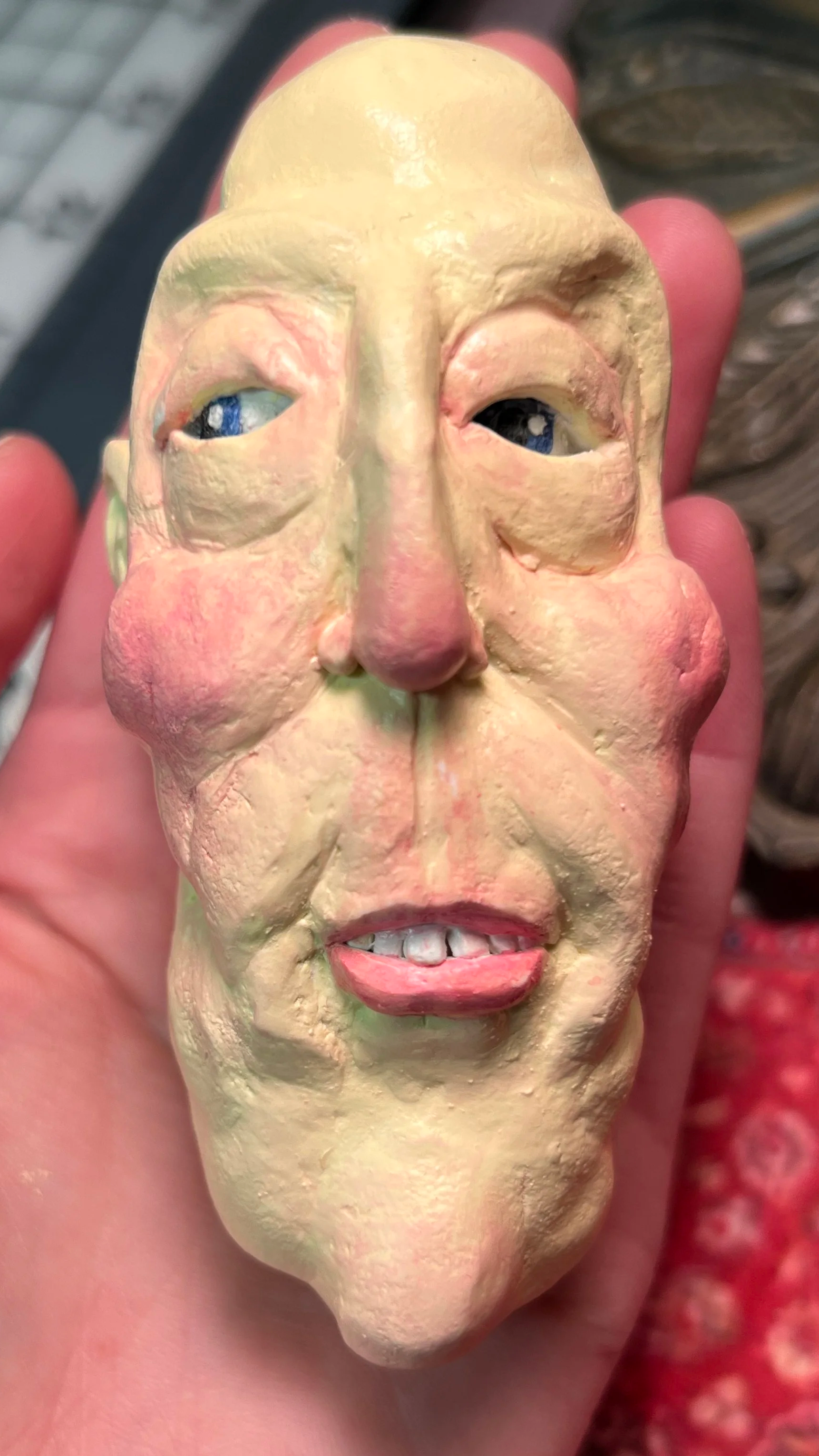 long head, 4" tall- polymer clay and acrylic paint