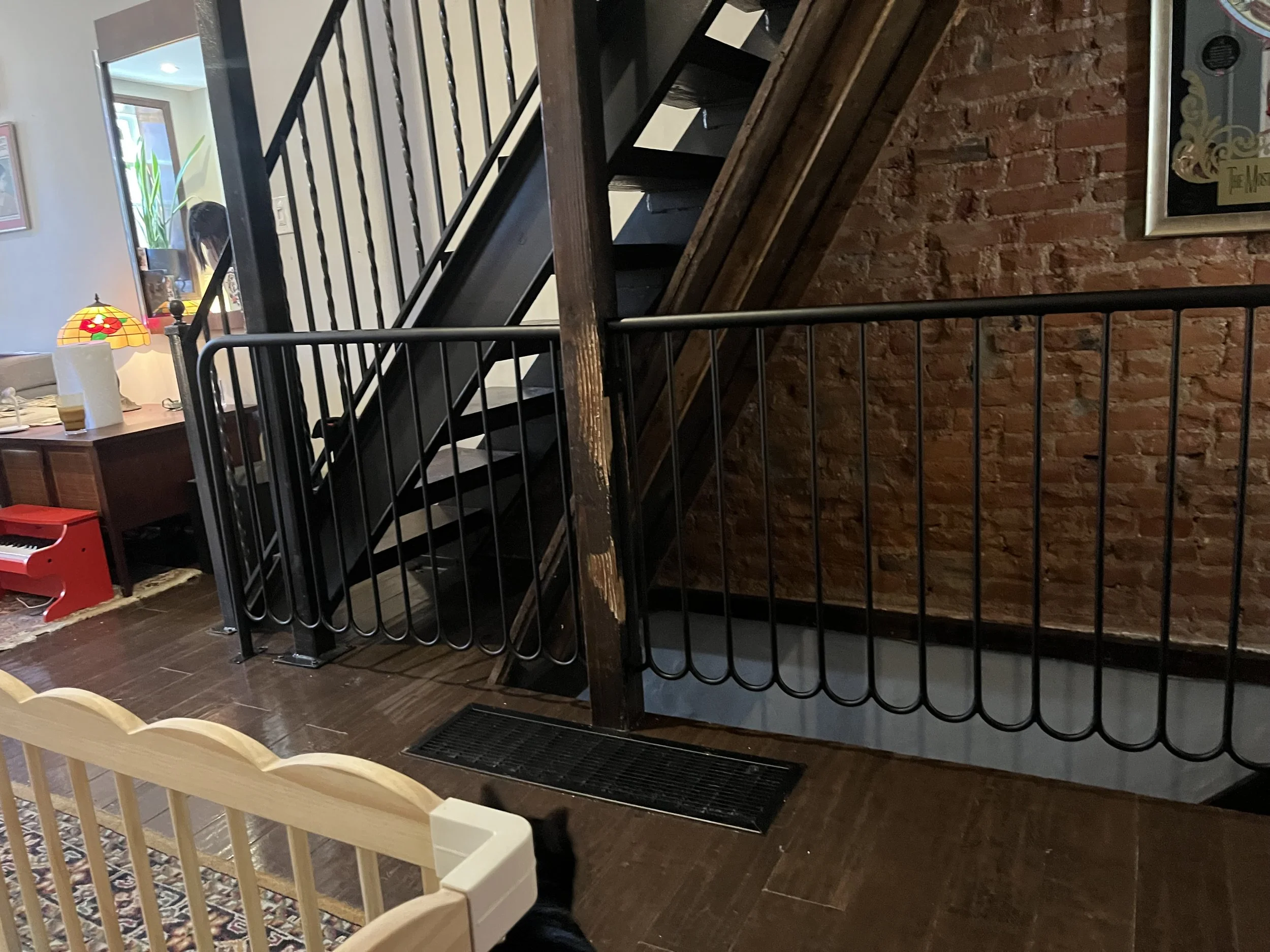 Interior guard rail with scalloped detail. 