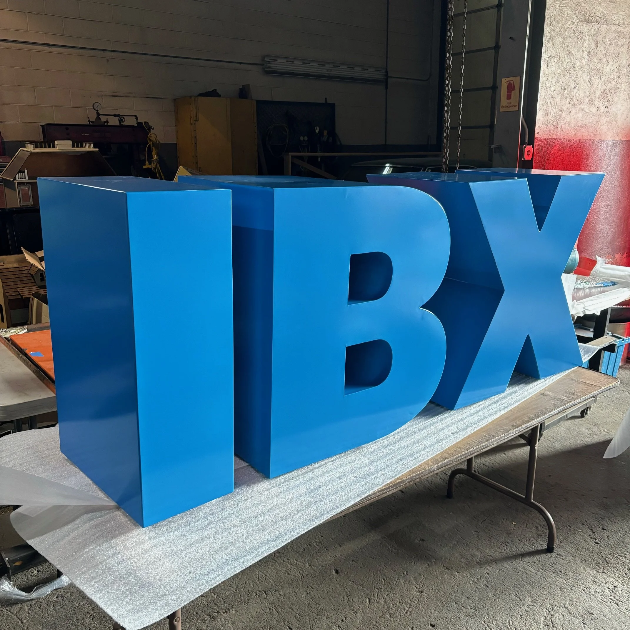 Blue Box letters "I B X" made of aluminum