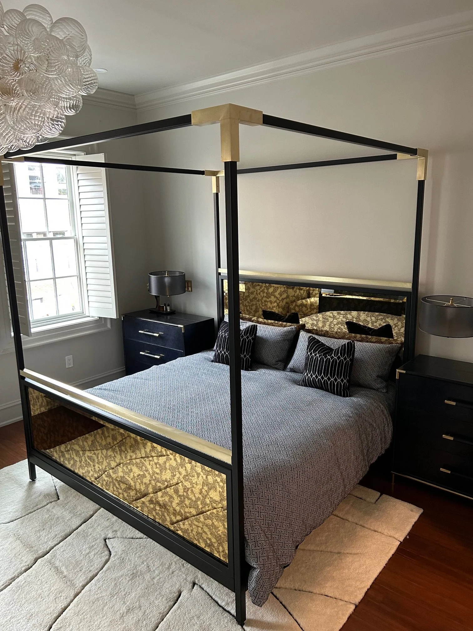 Steel & Brass bed with antique mirror headboard and footboard. 