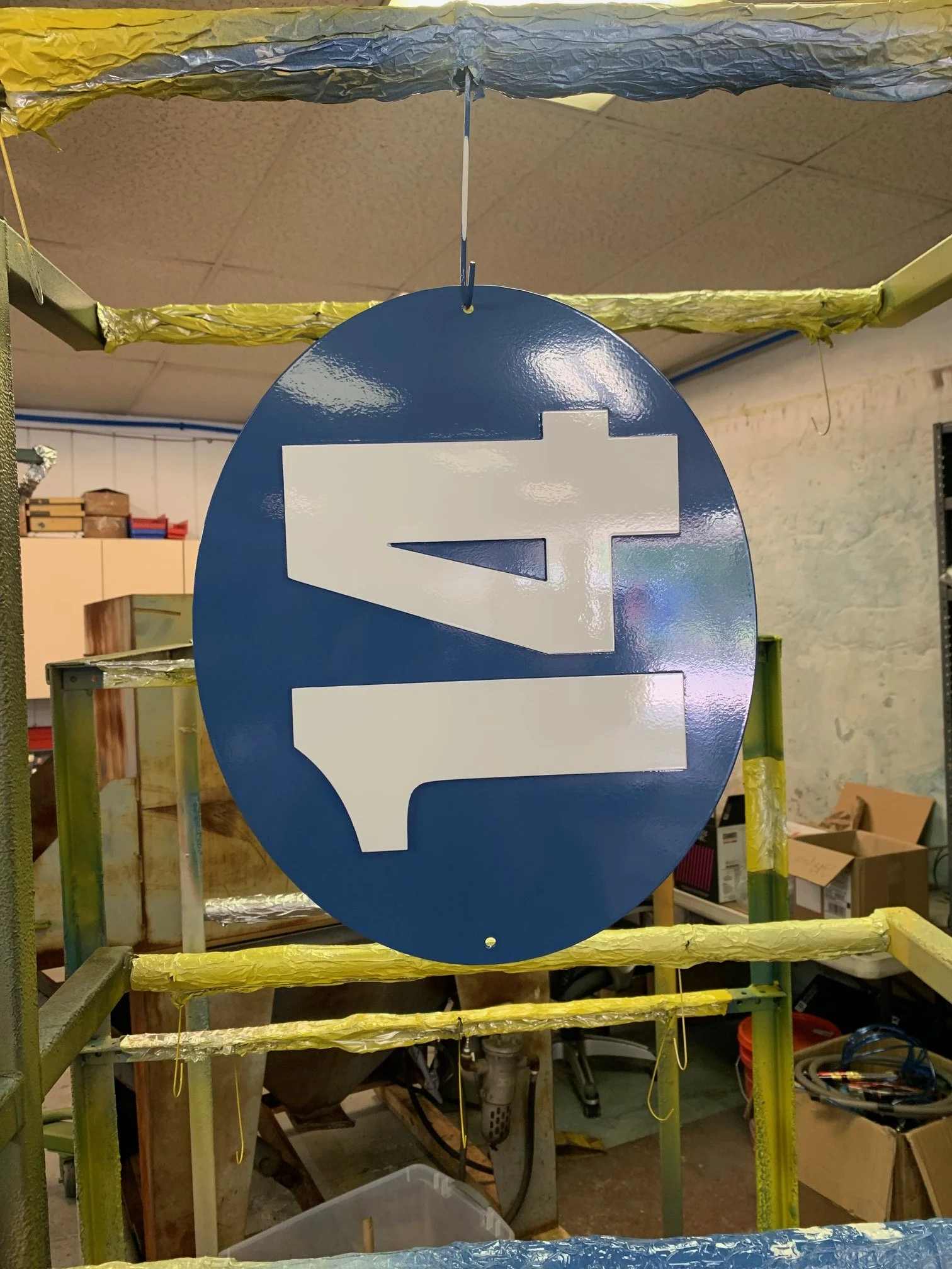 House sign with white numbers on blue background