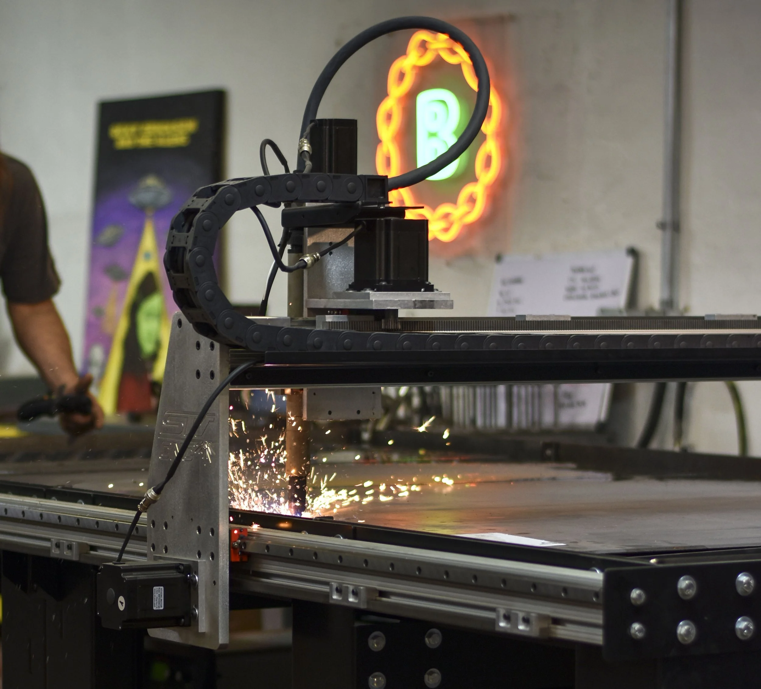 sparks from a plasma cutting machine on flat steel