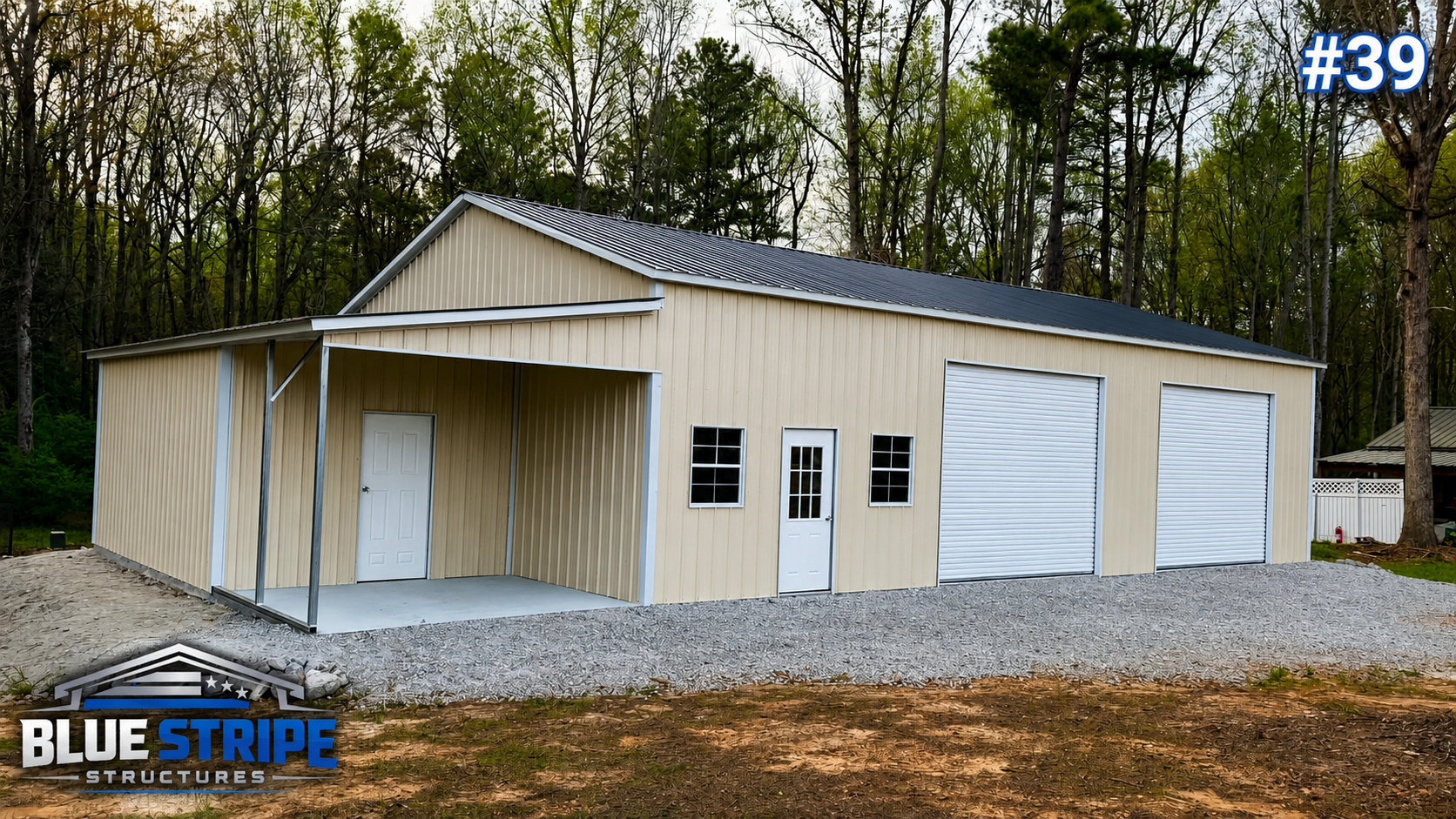 Custom black garage building with white trim and dual doors