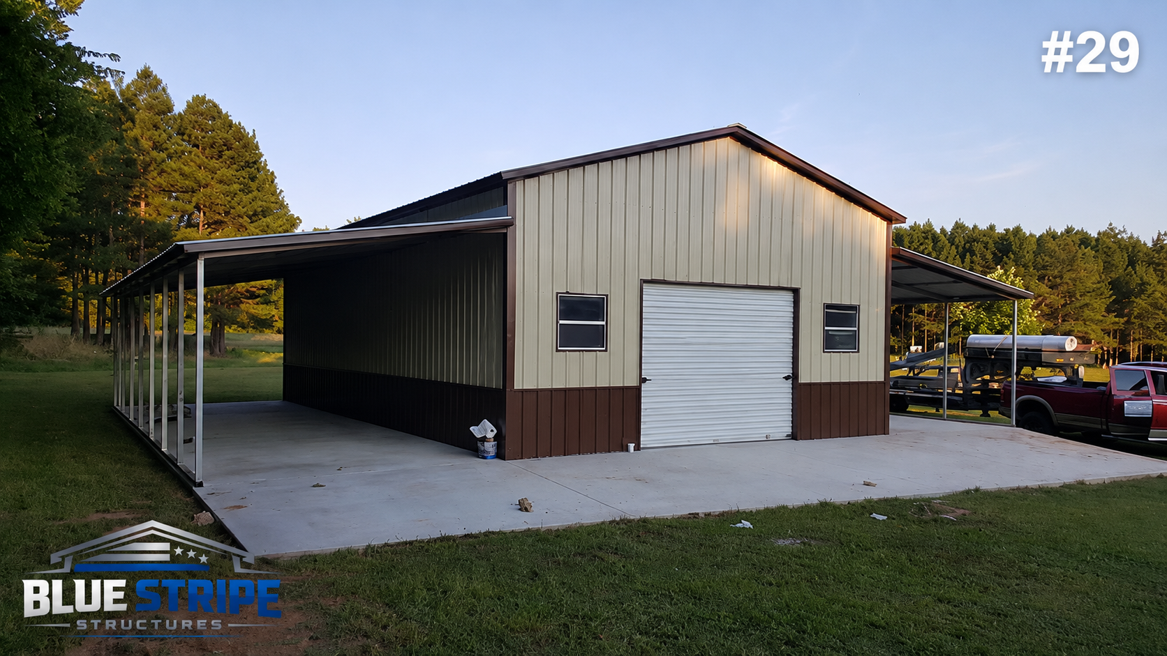 Metal garage building with covered wraparound concrete porch