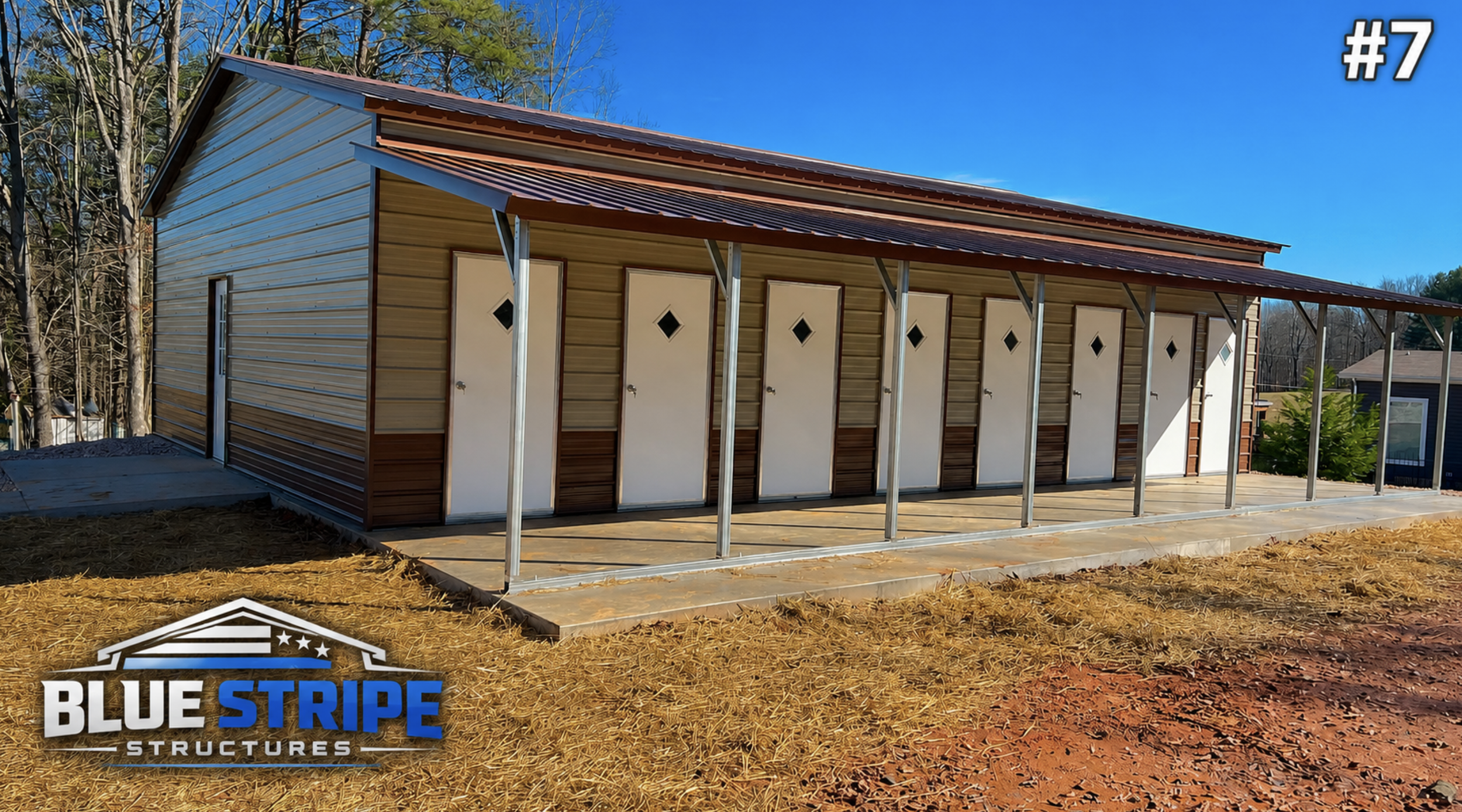 Metal utility building with covered front awning and multiple bays
