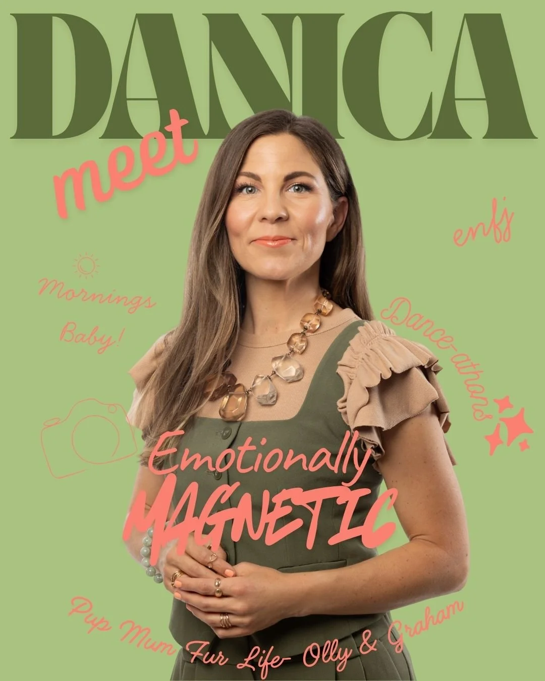 A woman with long brown hair, wearing a beige top with ruffled details and an olive-green overall, stands against a light green background. She has a large bead necklace and rings on her fingers, and is smiling slightly.