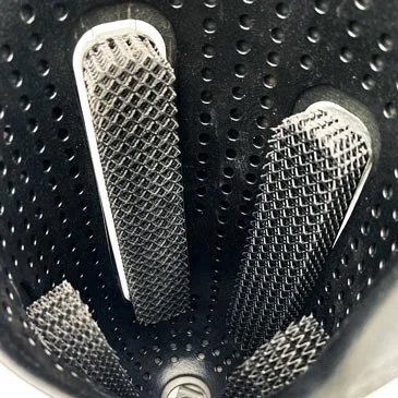 Close-up view inside a Quatro Adjustable Socket showing four flexible latticed compression panels against the perforated inner liner.