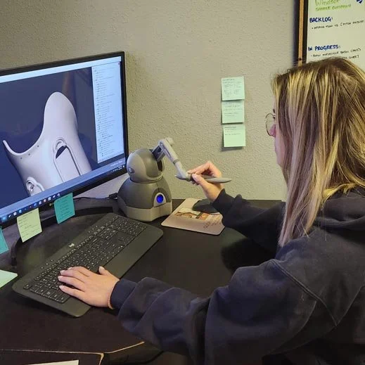 Greer designs a Quatro Socket on a computer.