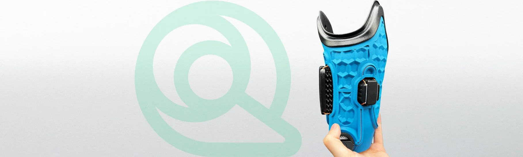 Close-up of a blue Quatro Adjustable prosthetic socket representing mobility and prosthetic innovation.