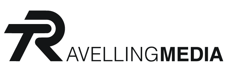 Traveling Media logo with stylized 'TR' and the words 'Traveling Media'