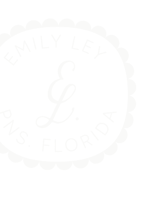Black and white logo featuring the text 'Emily Ley PNS Florida' with a decorative scalloped border and a stylized letter 'L' in the center.