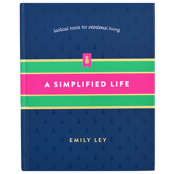 Book titled 'A Simplified Life' by Emily Ley with a blue background and pink and green striped design