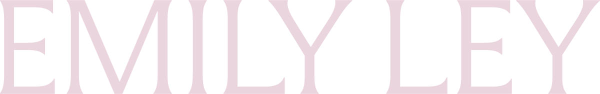 Close-up of the name 'Emily Ley' in large, light purple letters.