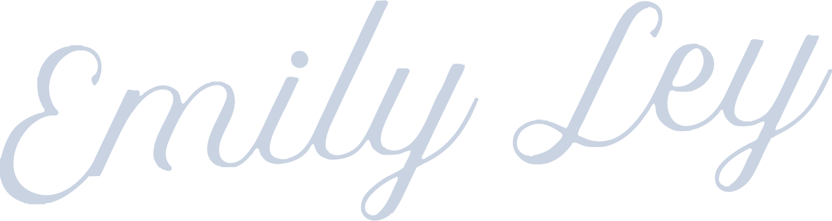 The text 'Emily Ley' written in light purple cursive font.