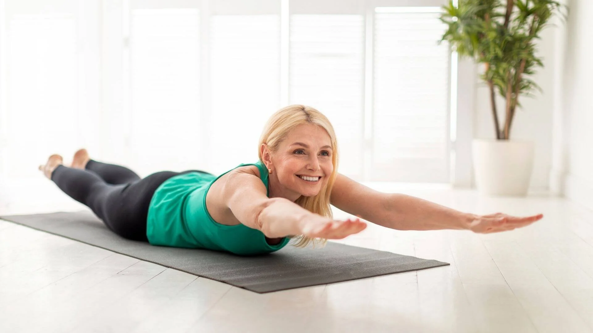woman showing Upper Body Workouts You Can Do Anywhere