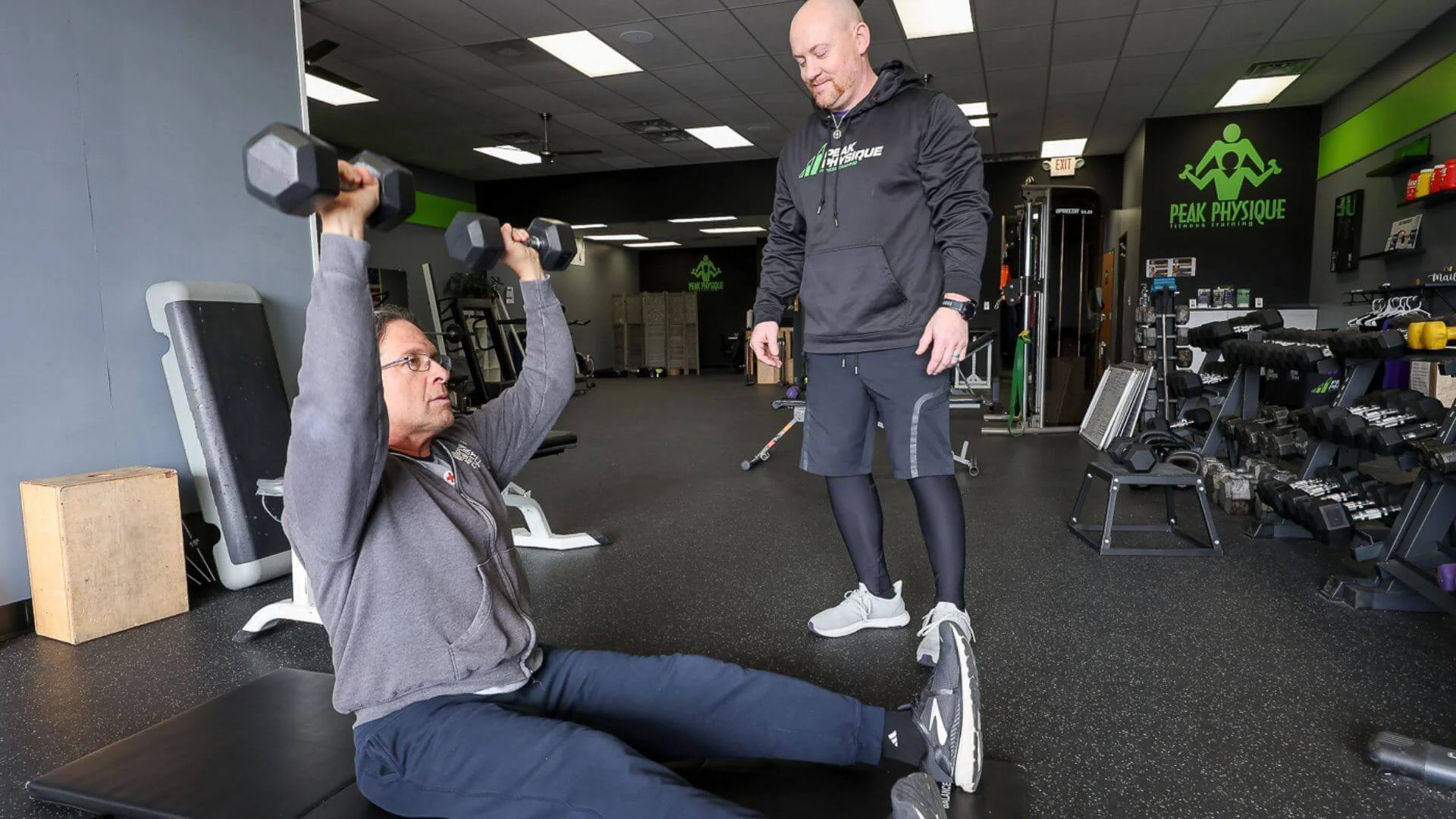 nick, personal trainer, working with a client