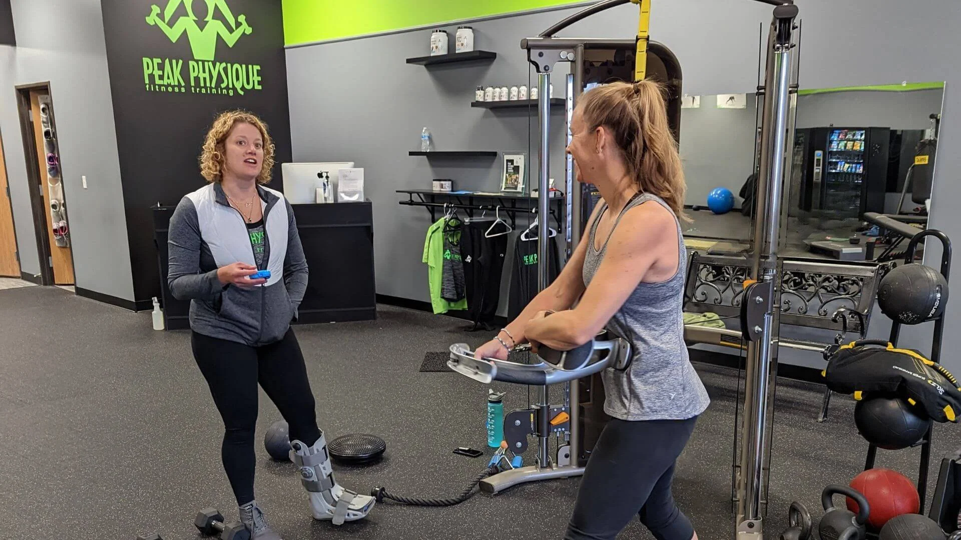 lisaa, personal trainer, talking to a client
