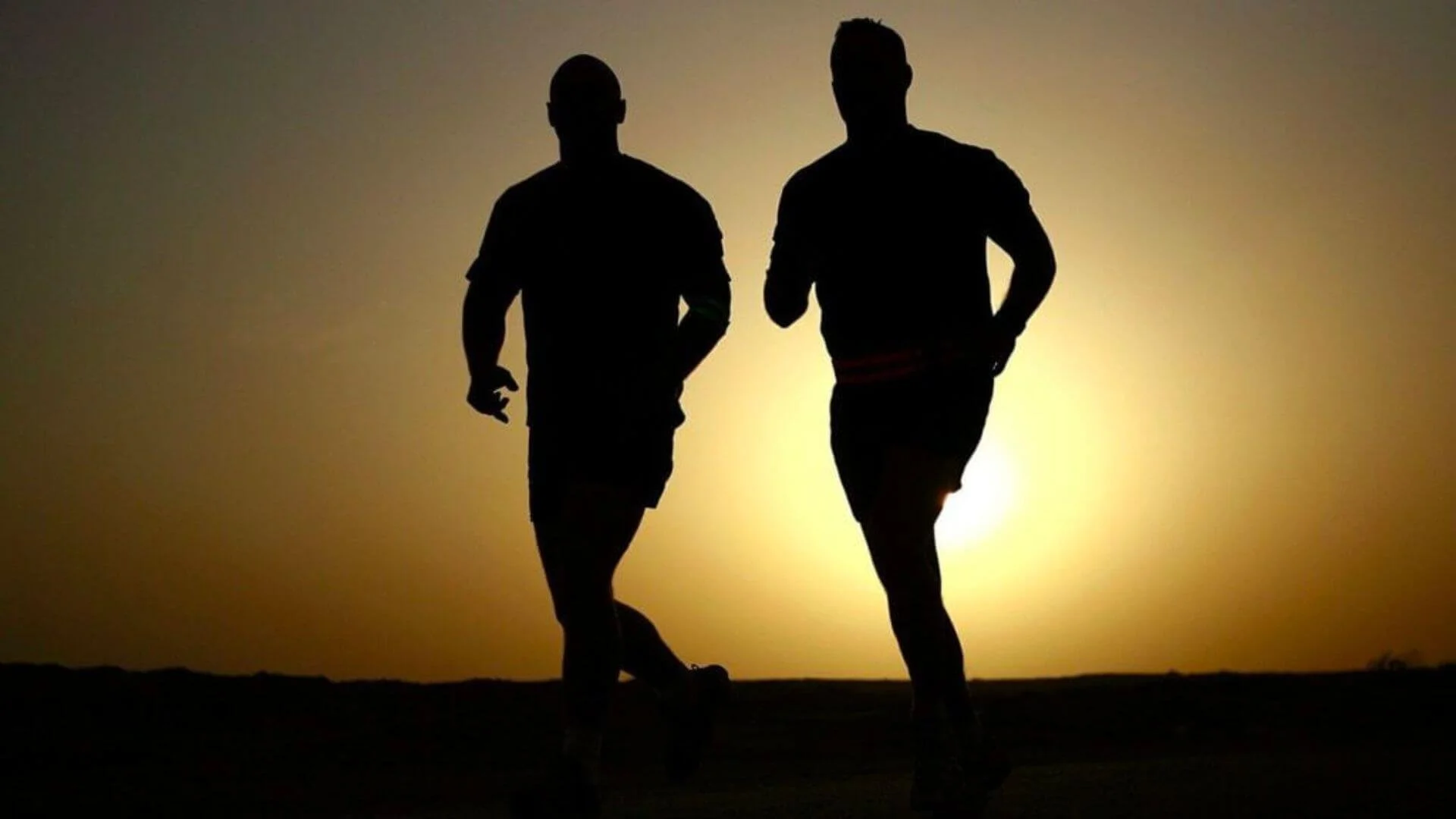 two people running