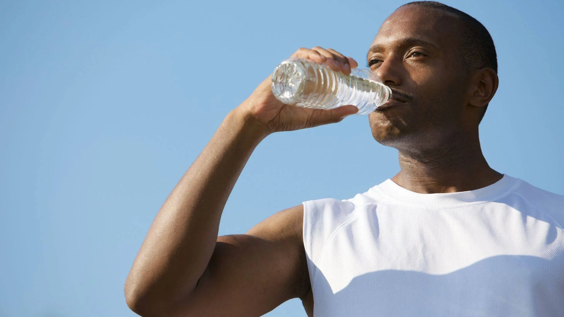 man drinking water