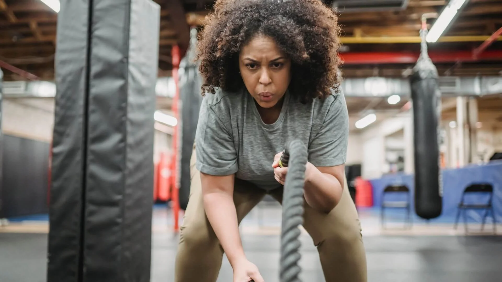 woman exercising with ropes
