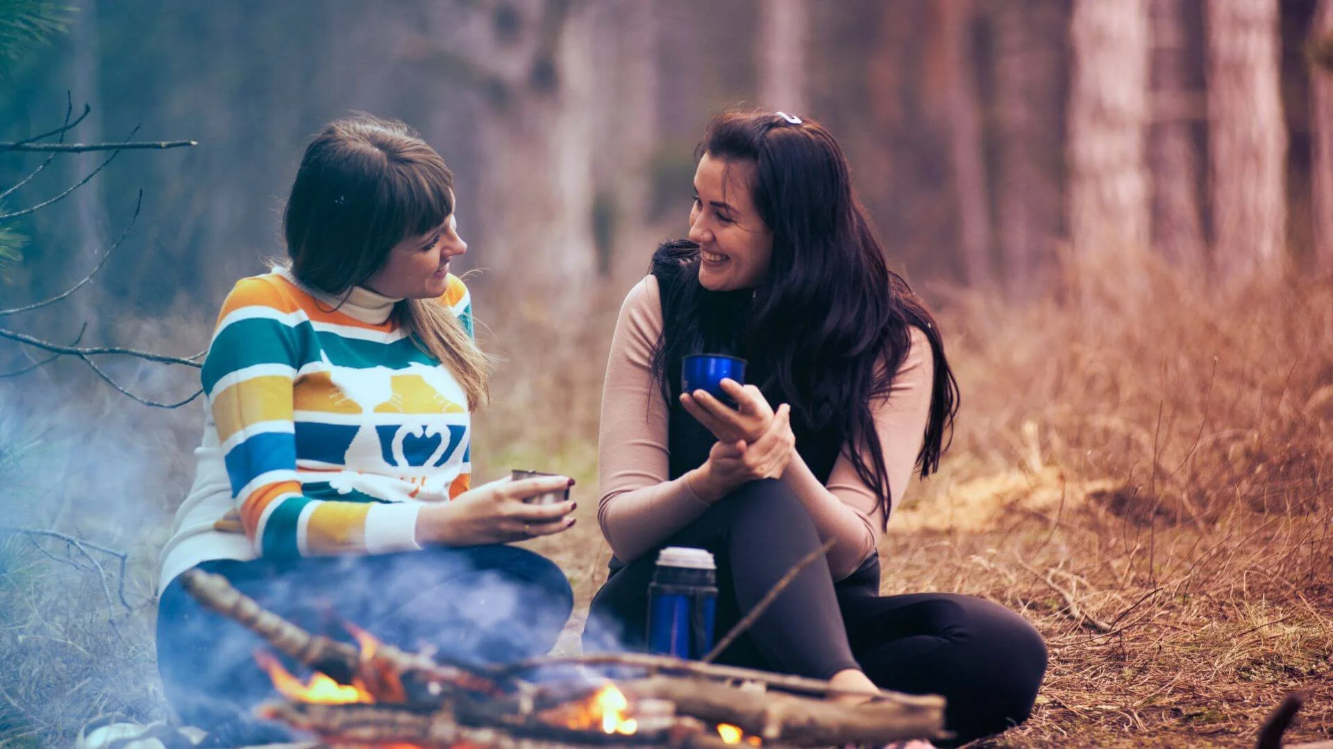 two women enjoying the outdoors while talking