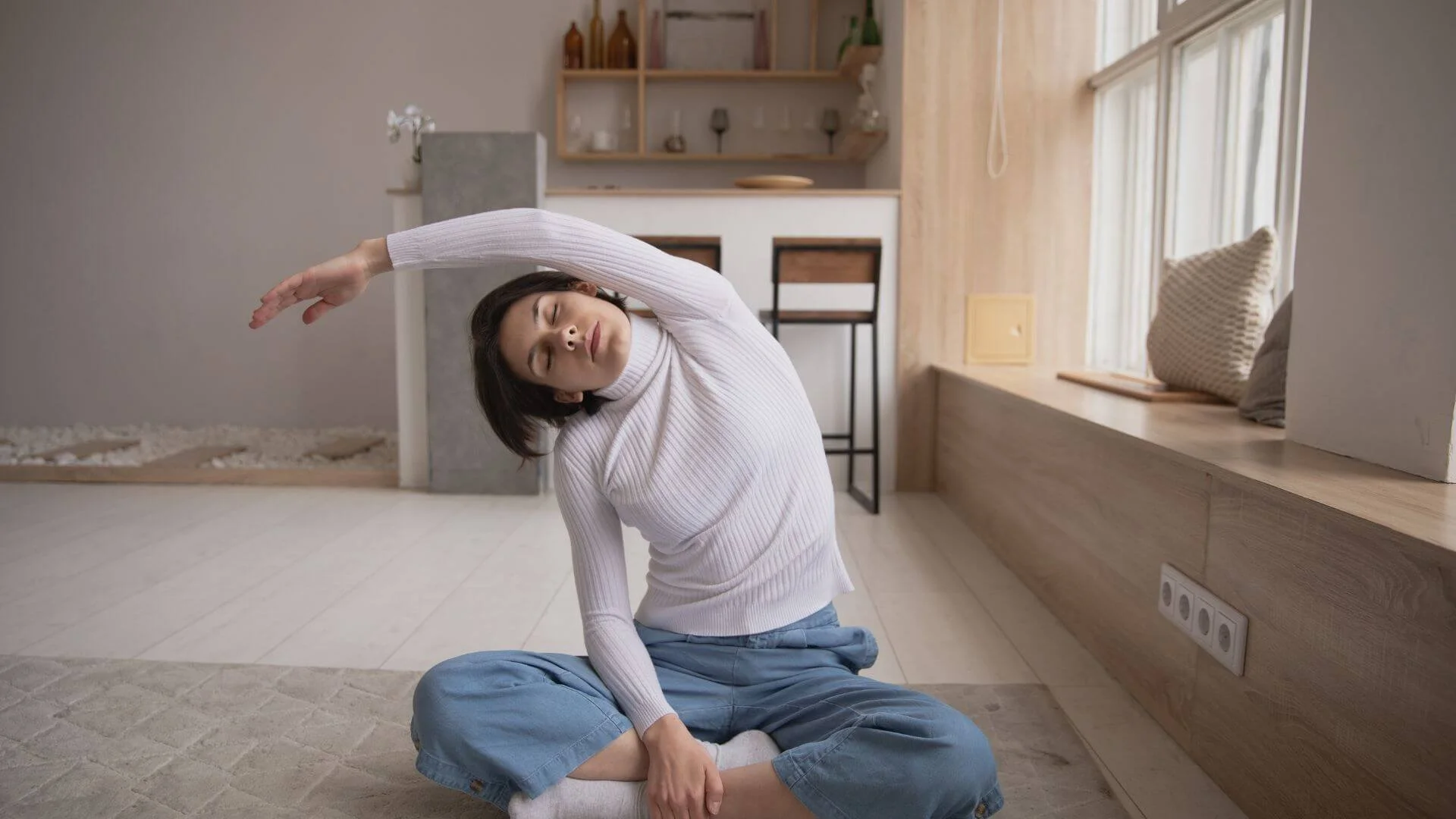 woman doing an easy flexibilty exercise at home