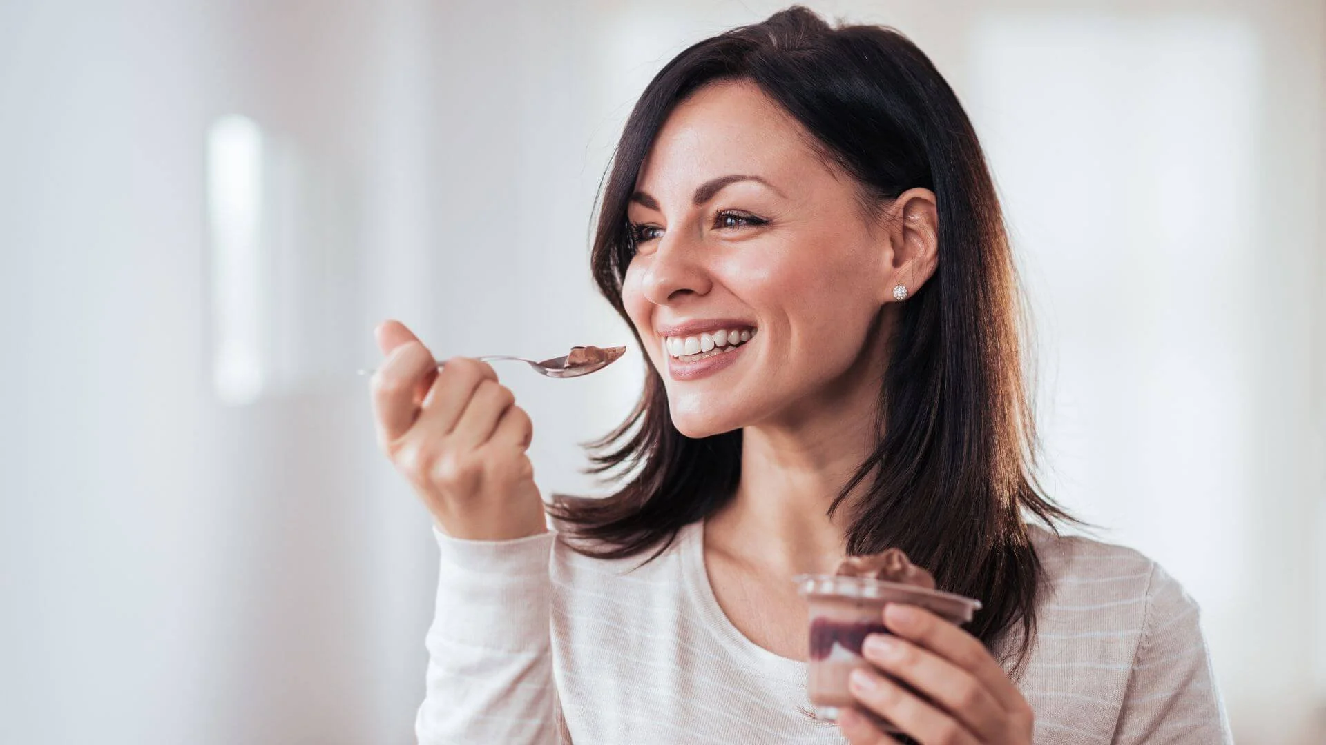 woman smiling with eating intuitively